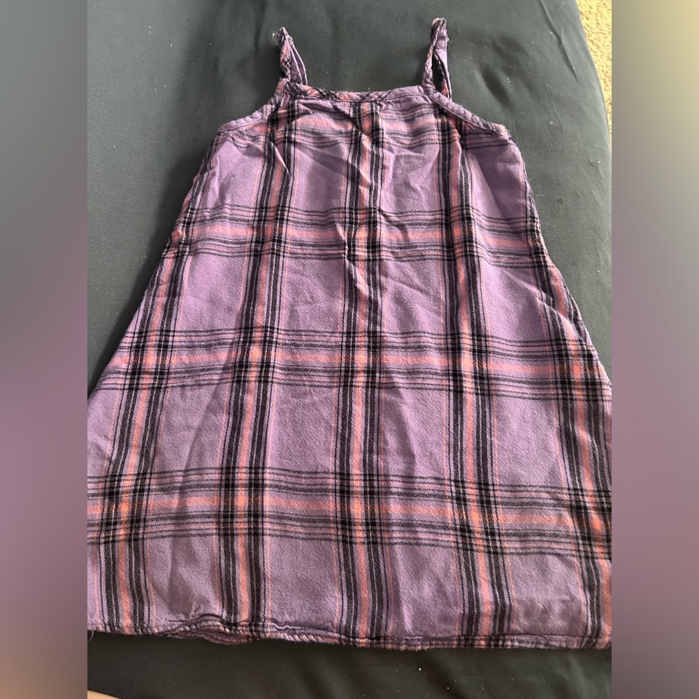 Casual dress- sleeveless . Nice on top . Slightly used , good condition.